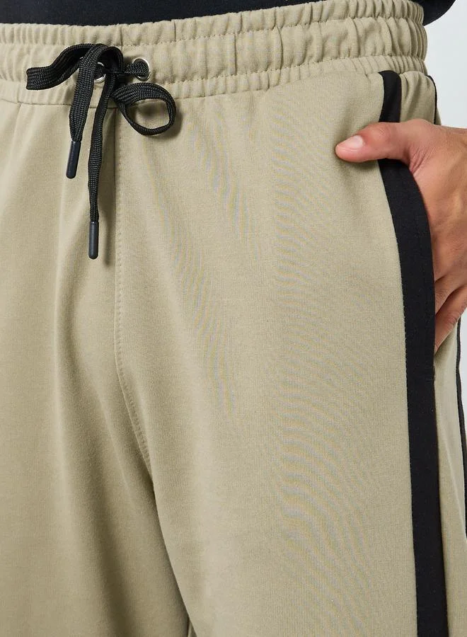 Styli Men Striped Oversized Terry Joggers